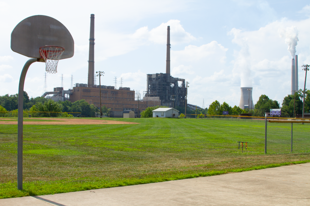 Basketball court with power plant in the background