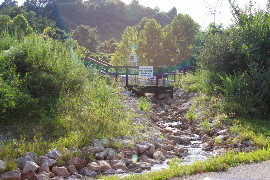 A creek flowing off of a coal waste site